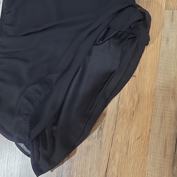 ASTR The Label - Black Sheer Overlay V-Neck Sleeveless Ruffle Embellished Romper - Picture 9 of 16